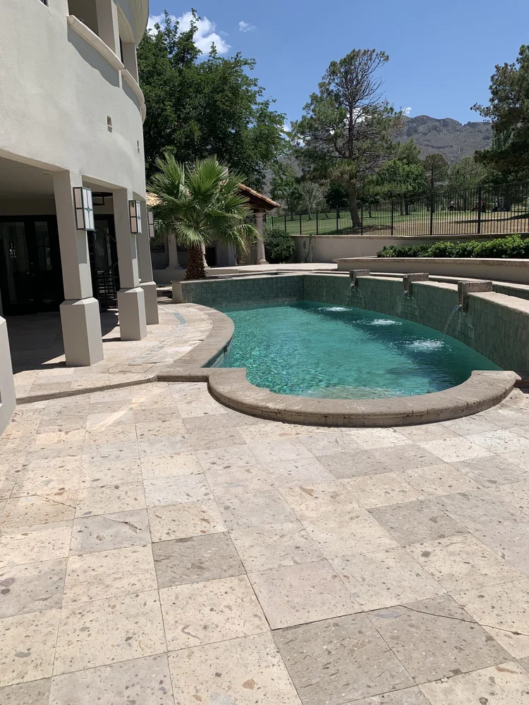 Curved Pool with Scupper Wall