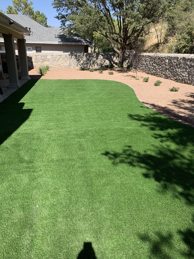 Backyard Turf & Stone Wall